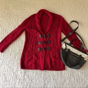 NWOT Red knit sweater with chocolate enclosures